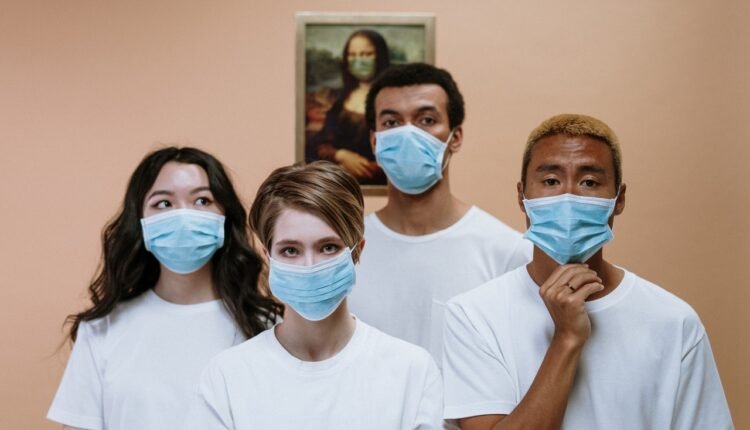    group-of-people-wearing-face-mask-3957992
