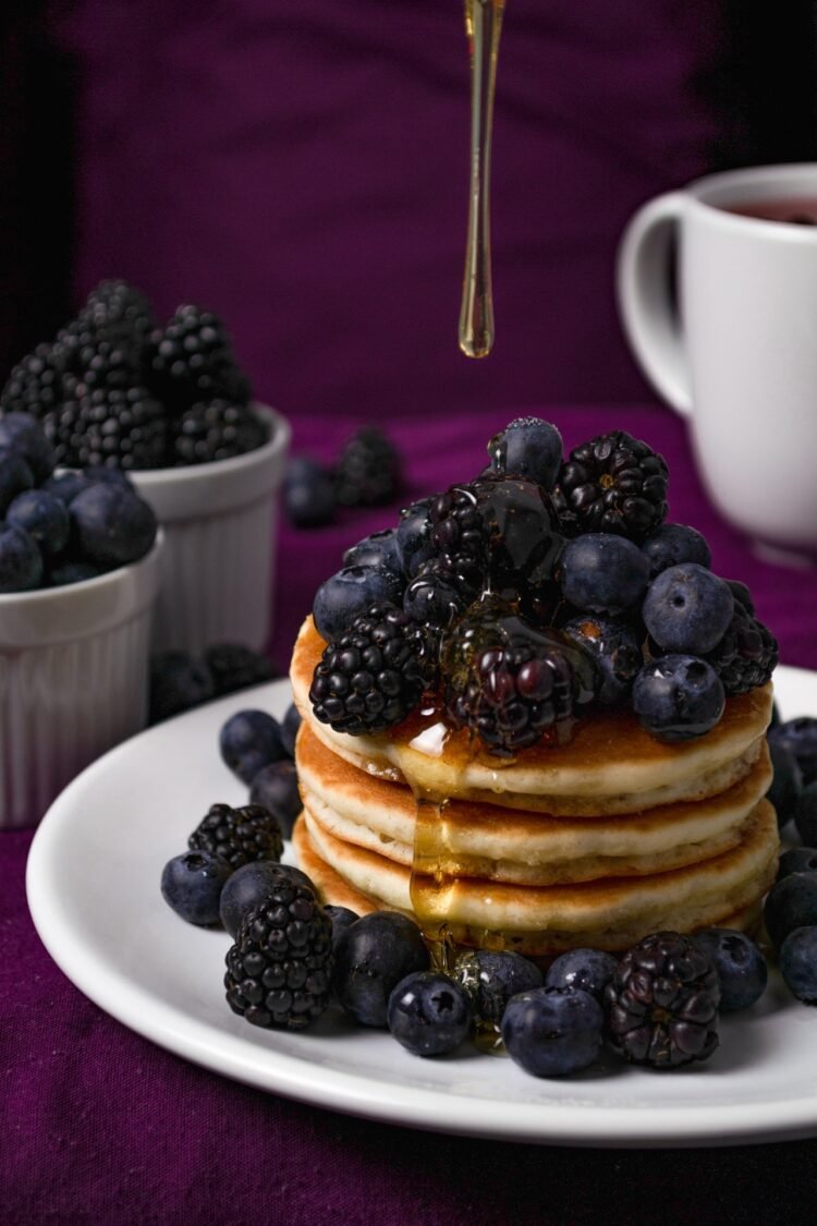    pancakes-with-black-berries-on-white-ceramic-plate-3780469
